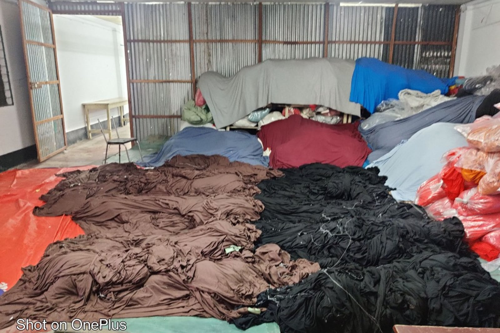 H & MR Supply Chain garments factory — sewing production line with industrial machines